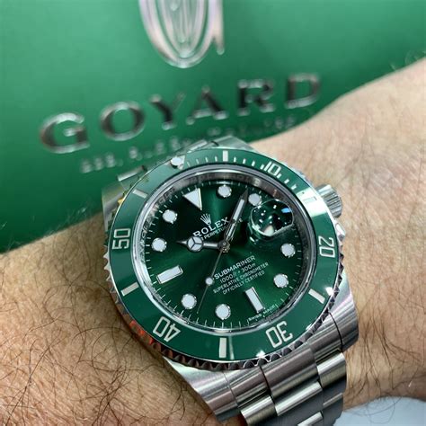 rolex green dial watch.